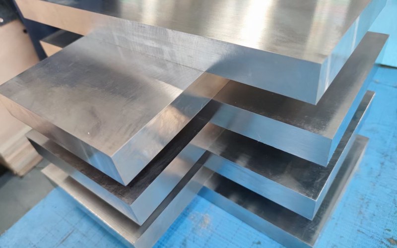 Stacked thick titanium plates for geometry and flatness review