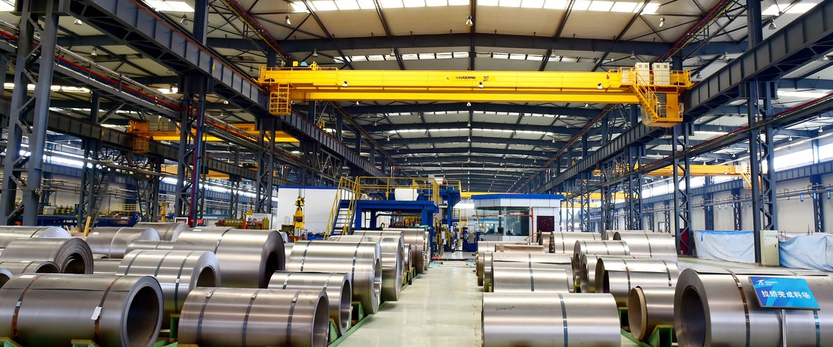 Titanium sheet coils stored in a workshop for plate and sheet processing