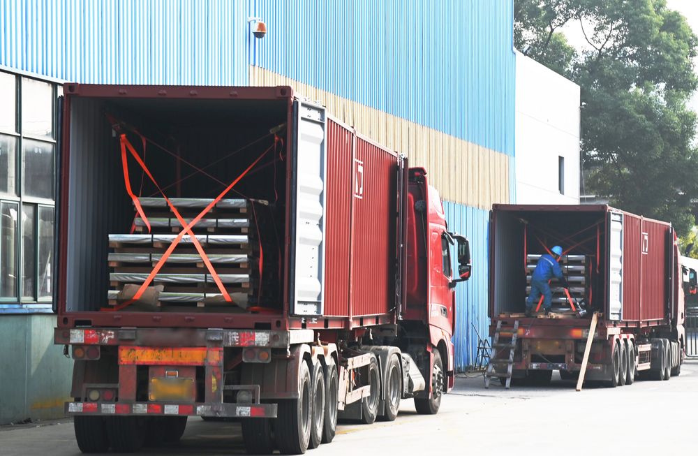 Stainless steel plate packages secured during container loading