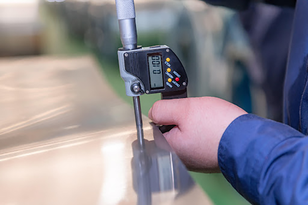 Micrometer measurement of precision stainless steel foil thickness
