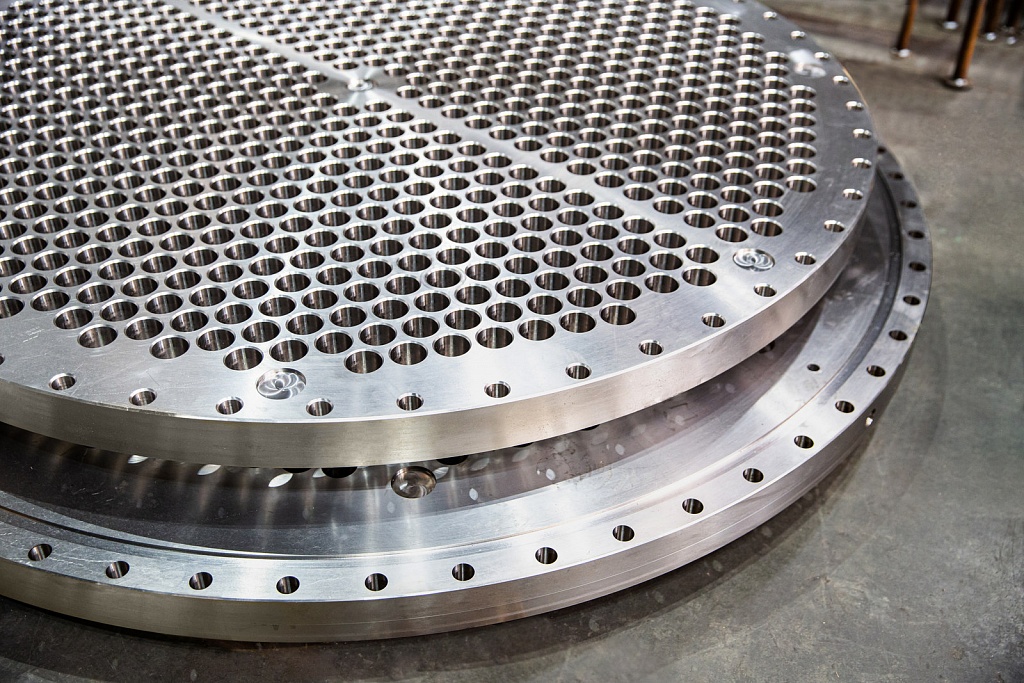 Machined tube sheet with drilled hole pattern
