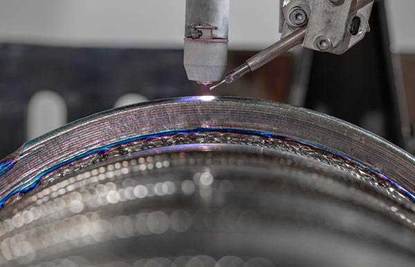 Titanium additive wire used to produce wire fed additive manufacturing preforms