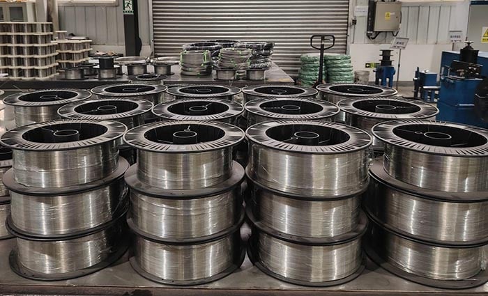 Titanium wire coils and spools for industrial supply