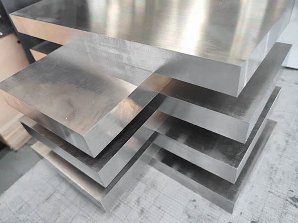 Titanium plate forging and controlled material stock for defense specification routes