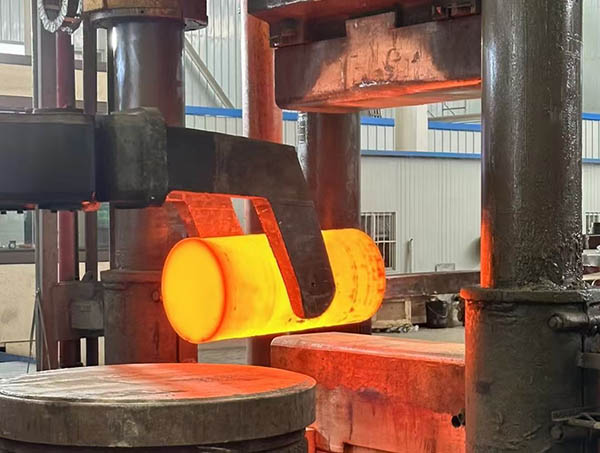 Hot titanium billet breakdown forging under hydraulic press