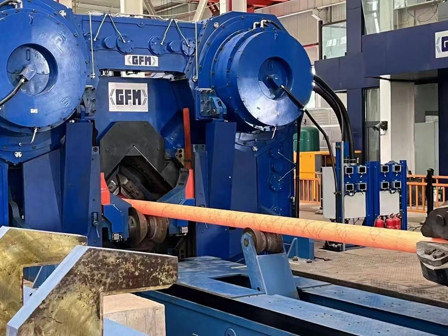 Hot working titanium bar by forging or rolling